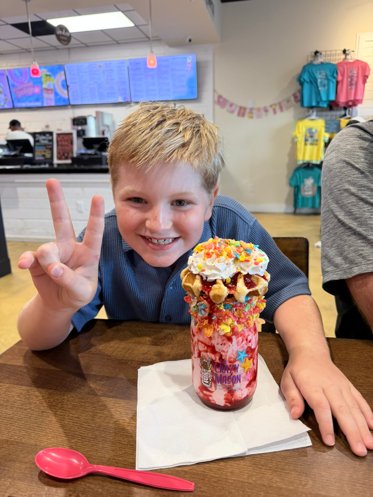 Cash with a giant loaded milkshake